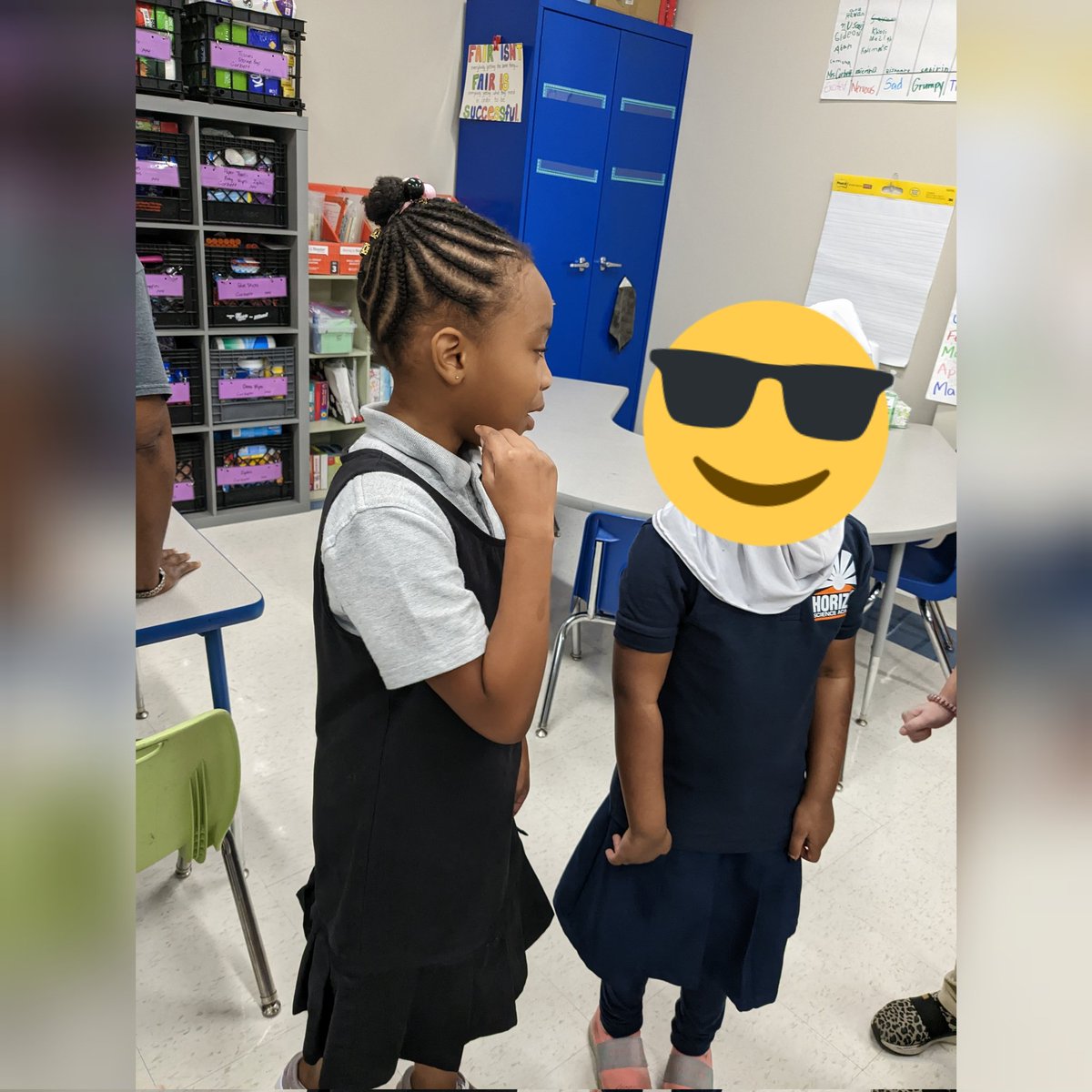 HSAColumbusPS's tweet photo. First graders had fun playing a guessing game today! Mrs. Corbett put community helpers on their back and then they practiced their speaking skills and questioning to figure out their community helper! #hsaprimary #weareconcept https://t.co/qvevRYl4jM