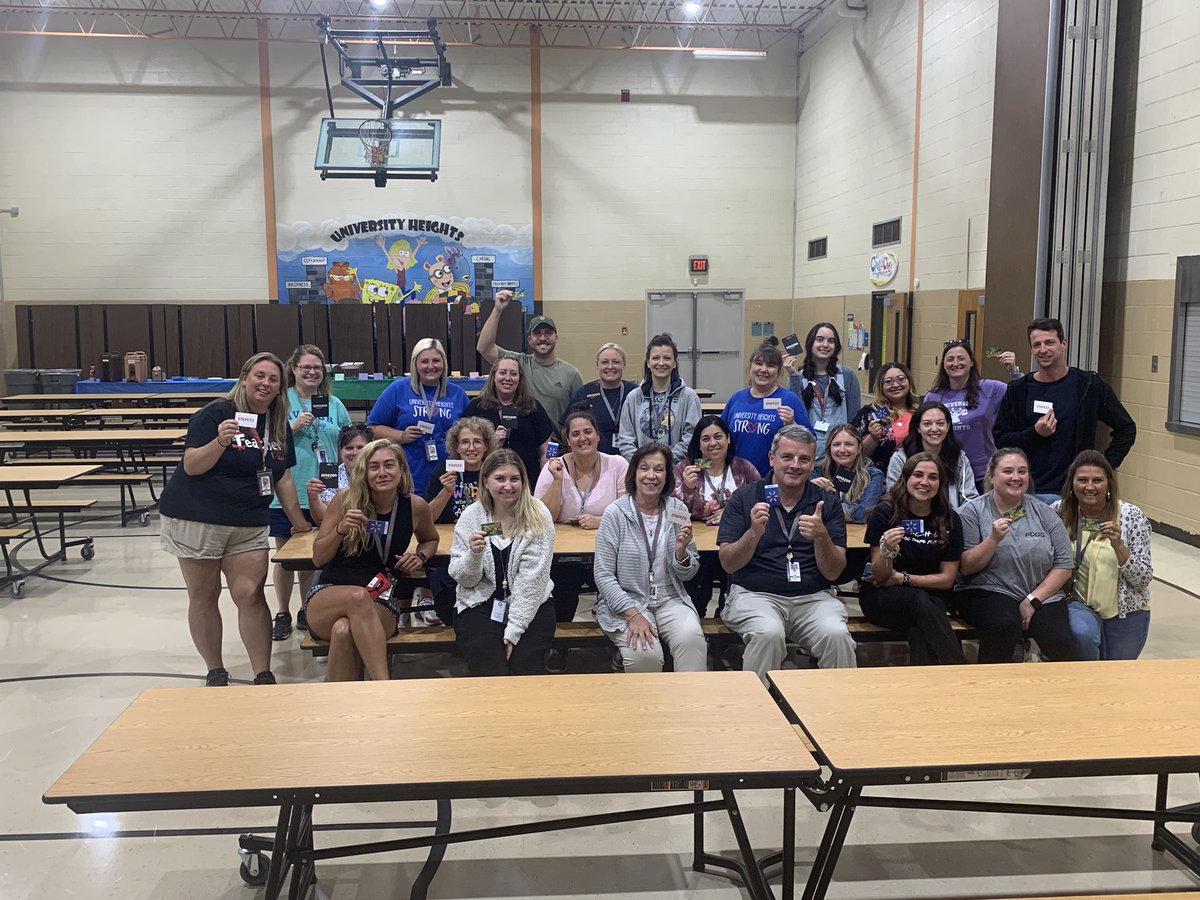 HTSD_UnivHts's tweet photo. UH teachers showing off their gift cards from the UHPTA and a sneak peek of some bulletin boards!  @WeAreHTSD https://t.co/DpHjdNd2IJ