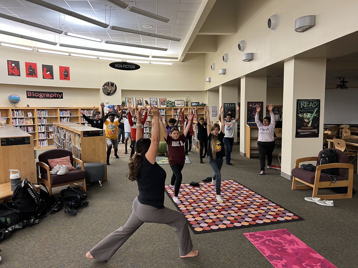 swisd_mcn's tweet photo. Challenger students participating in an early morning yoga session with McNair Librarian Ms. McCullom. #ChallengerFamily https://t.co/0Nvl2l9eKj