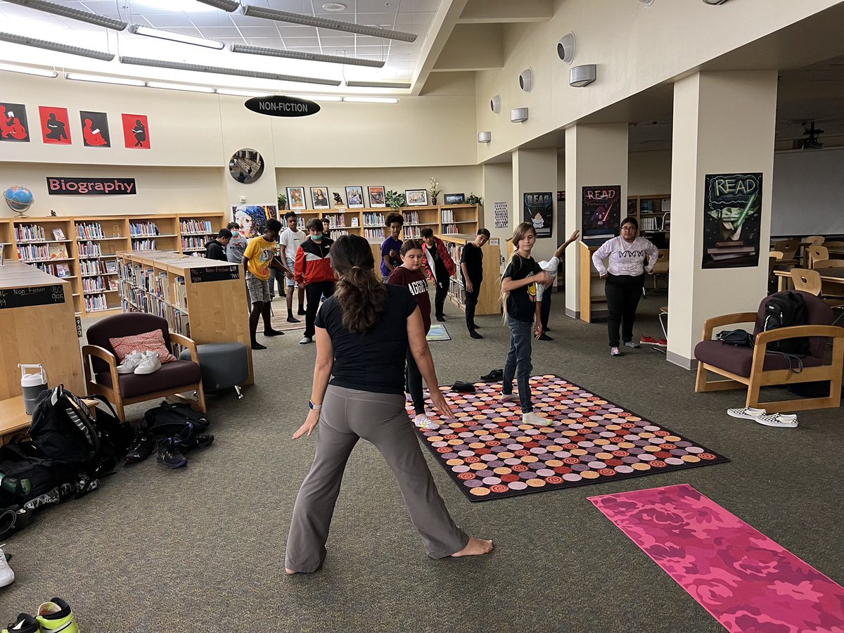 swisd_mcn's tweet photo. Challenger students participating in an early morning yoga session with McNair Librarian Ms. McCullom. #ChallengerFamily https://t.co/0Nvl2l9eKj