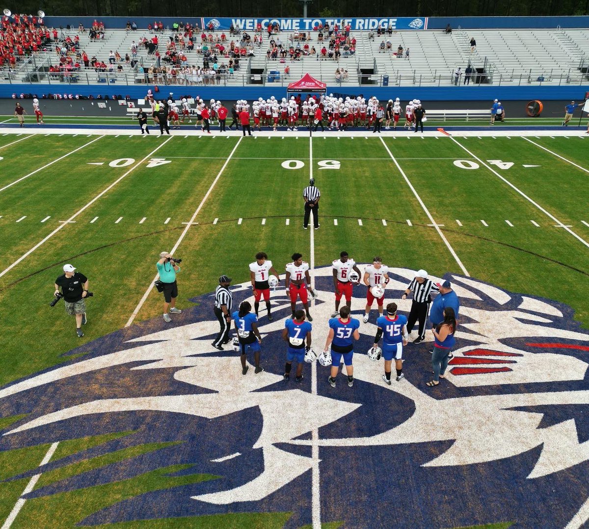 PRidge_AD's tweet photo. 1st of many on our incredible @STCFieldBuilder field!  Not the result we wanted but good things coming! Thanks @Ridgeathletics for rolling deep, our PRYAA family for coming out on Youth Night &amp; our Cheer Lions &amp; Marching Band for their support! @PTRFootball is going to #FindAWay https://t.co/oaXcrKsSeZ