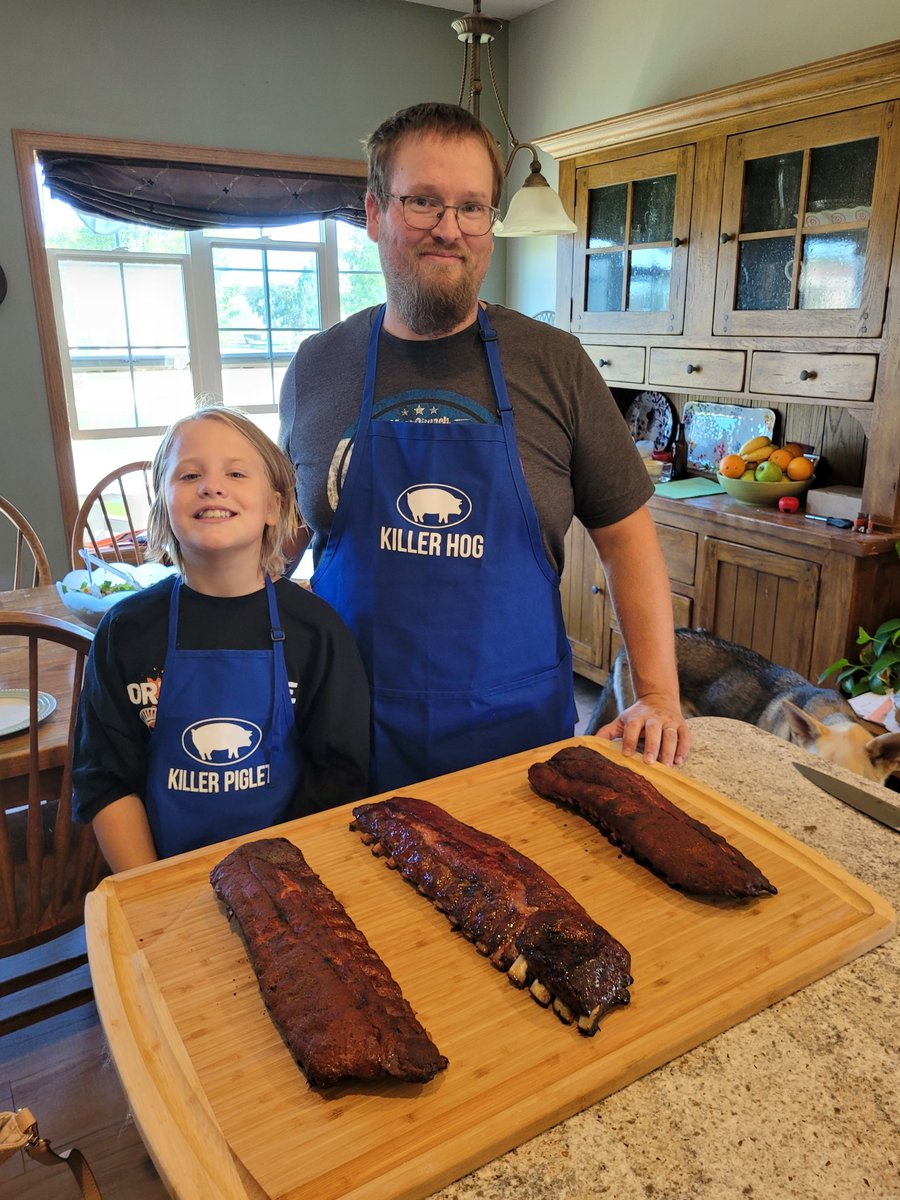 perhamband's tweet photo. The boss and I fired up some baby backs today with our new gear from @HowToBBQRight.  The ribs turned out great and we looked pretty darn sharp. Not a bad way to start a long weekend! https://t.co/B9xukkHAJY