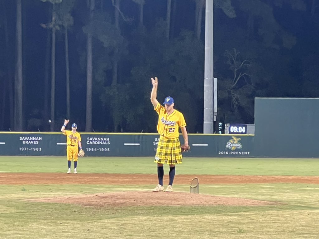 TheSavBananas's tweet image. The ultimate power move: Jonathan Papelbon pitching in a kilt with his 2007 World Series trophy behind him