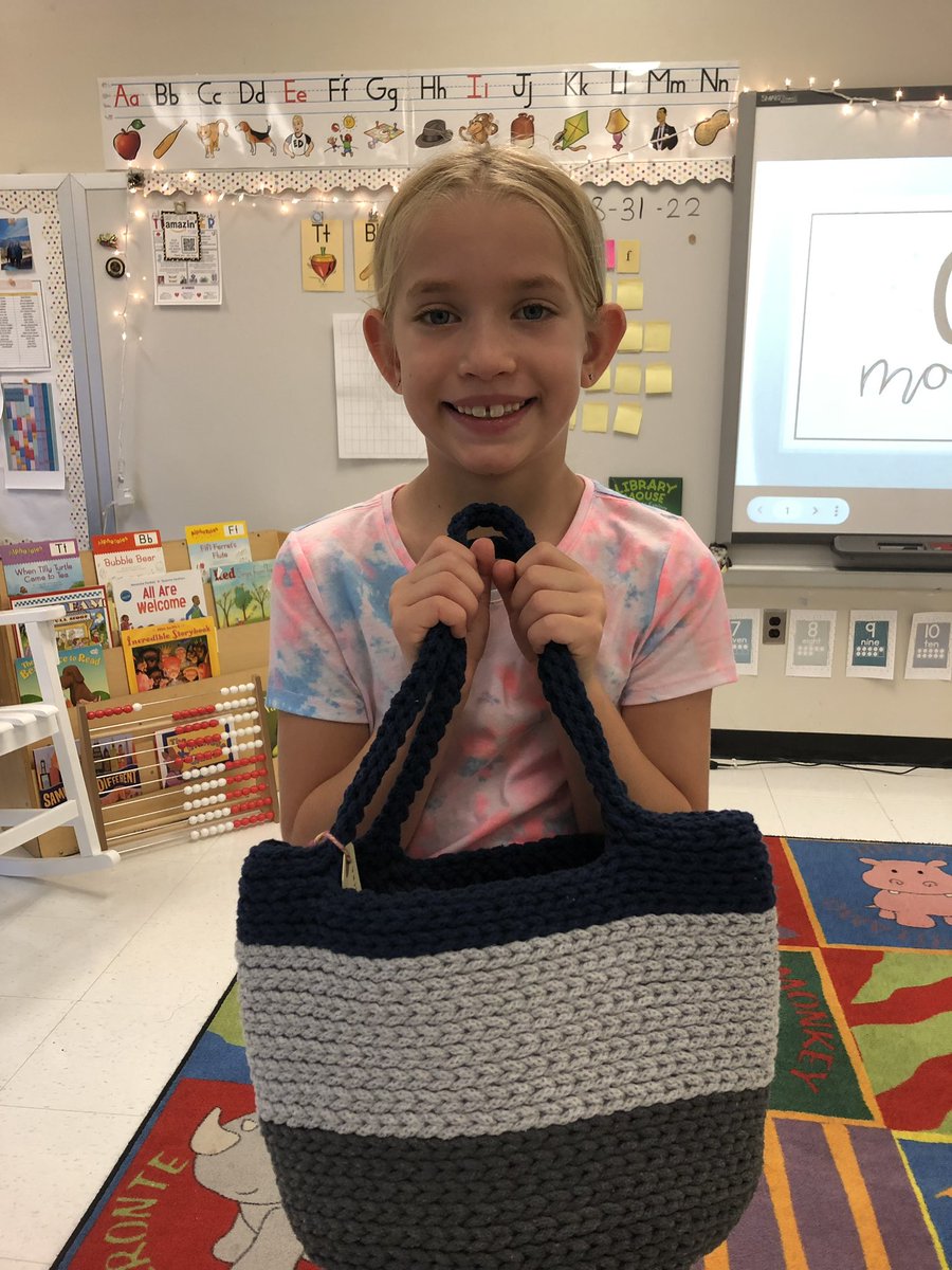 TY to Mrs. Straw, IS@G’s IC &amp; family for donating a hand-made Ukrainian purse to our culture kits! Women who made it are seen in the photo. Families are welcome to donate artifacts they have from different countries to our culture kits as part of Gregory's global initiatives.