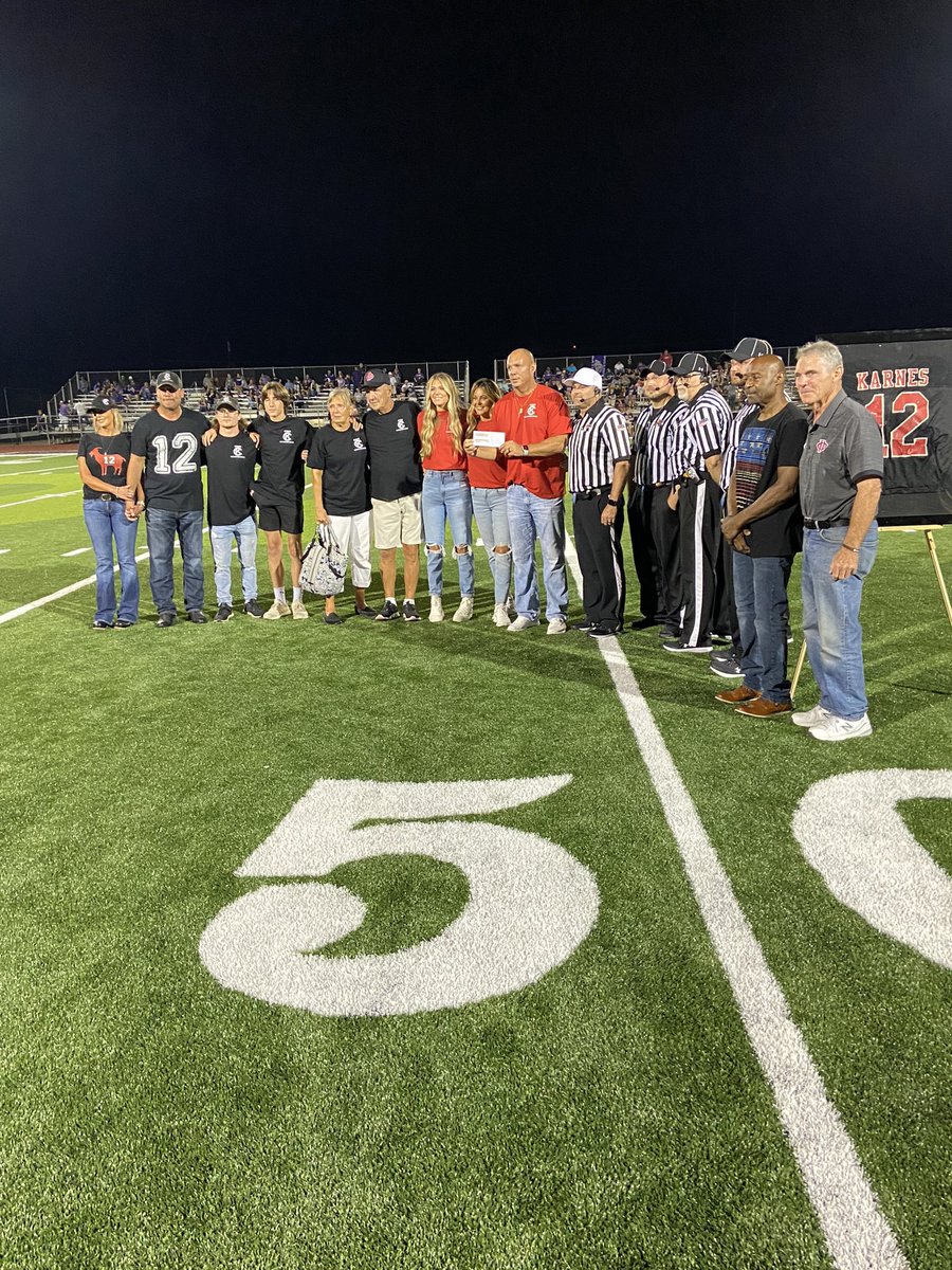 Jason Karnes, Class of ‘93 and QB of the 1992 14-0  3A State Champions has his #12 retired.