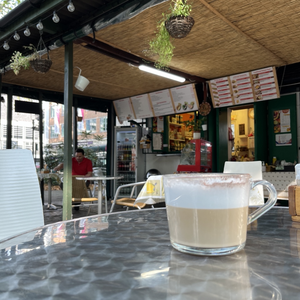 The cafe in the square is open