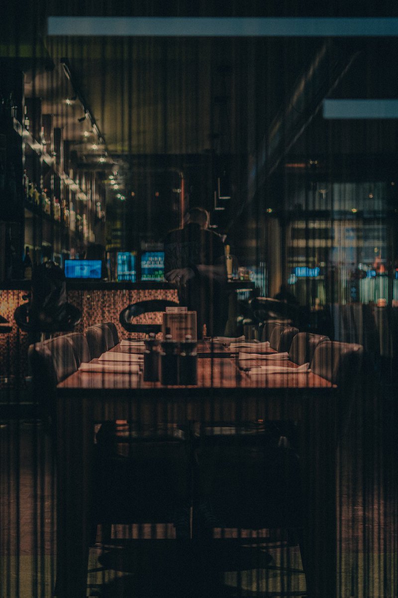 shutterpwnd's tweet photo. GM ☕☀️ - the lonely 

lucky shot through a curtain inside the shiny bar.

#streetphotography #photography #NFTCommunity #nftart #nftcollectors  #Germany https://t.co/ldz4Xnr5zo