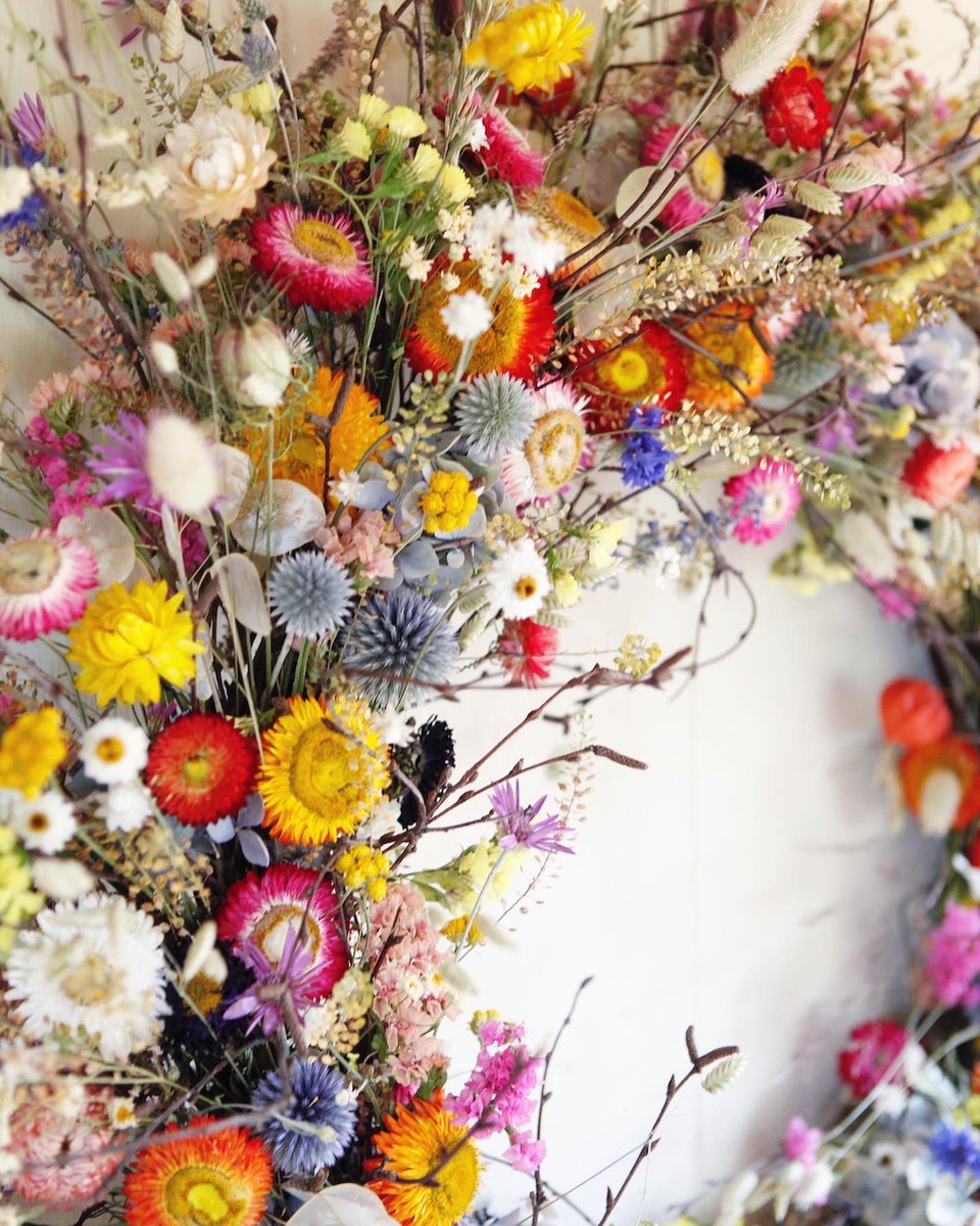 LaylaRobinsonfl's tweet photo. Bright and wild. This was so lovely to make, knowing it was going into a new (but very old and beautiful) home tucked up in the Herefordshire hills. There's definitely a touch of magic where this wreath has gone. https://t.co/RezgVfZ2JJ