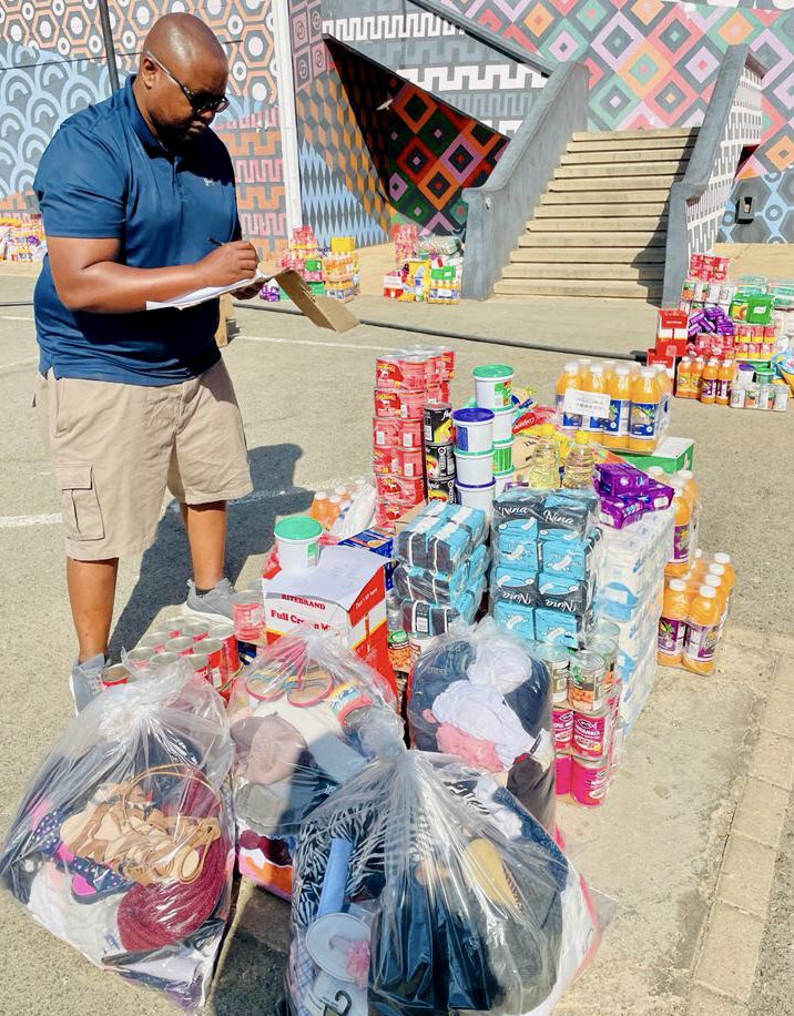 CoFeedNam's tweet photo. CoFeed volunteer @Ngari does an itemized check of foodstuffs and clothing destined for the San community in Ohangwena. Shout out to all those who gave freely of their time to assist us today! https://t.co/7H8SdP0pPB