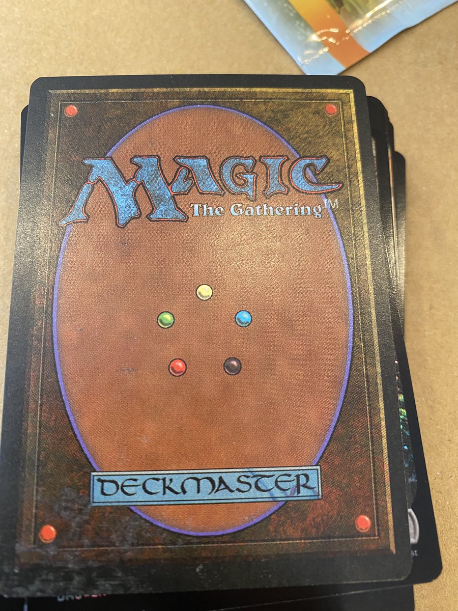 kevinan's tweet image. Opened a Nicol Bolas from a collector booster and it’s got either ink or mold. Fun times @Wizards