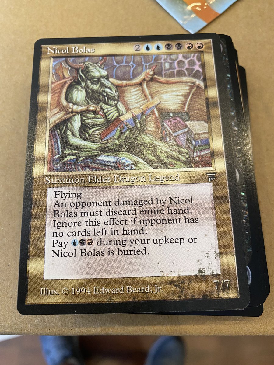 kevinan's tweet image. Opened a Nicol Bolas from a collector booster and it’s got either ink or mold. Fun times @Wizards