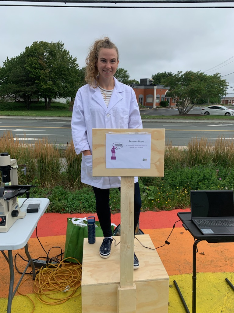 SoapboxSciNL's tweet photo. #SoapboxScienceNL 2022 has kicked off at the @sjfm! @Professeltine and Rebecca Noort work together on a common heart condition in the province. They've brought lots to play with, as volunteer Praveena clearly shows! Catch them until 12:30! https://t.co/X5b1XKPhw4