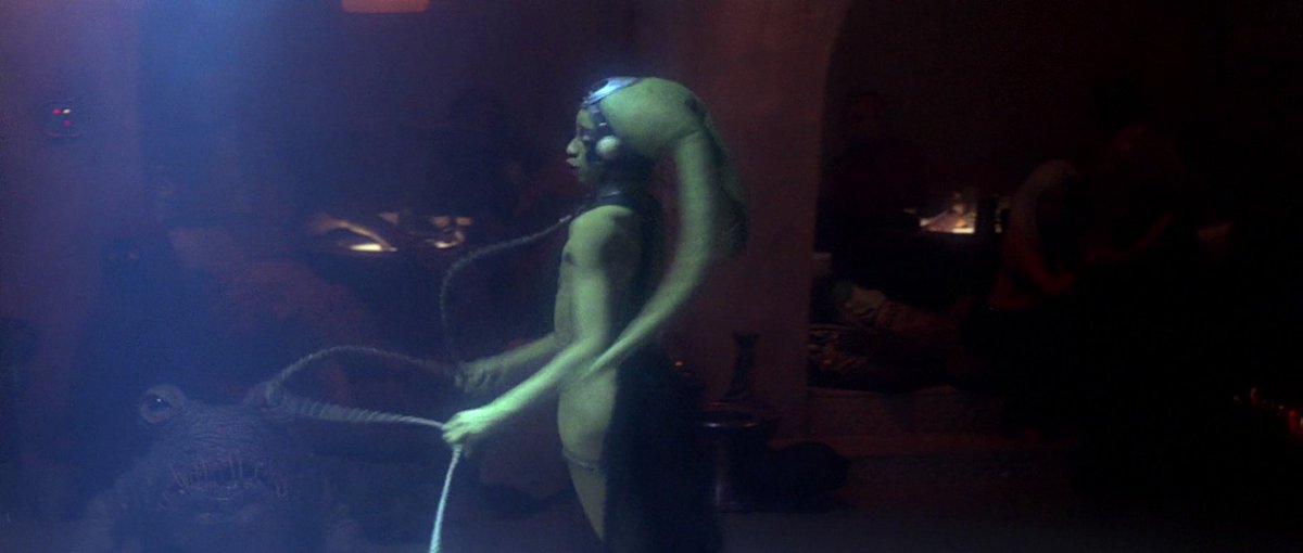 Another day, another dance by the lovely Twi'leki dancer.  The chain attached to her collar ensures that this is the life she'll forever live.