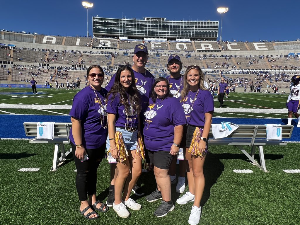 UNIFootball's tweet photo. UNI is proud to have honorary captain Master Sgt. John Walker join the team on the field for his birthday. Walker is a UNI alum and Air Force veteran. #EverLoyal https://t.co/PBQfHCE1Iu