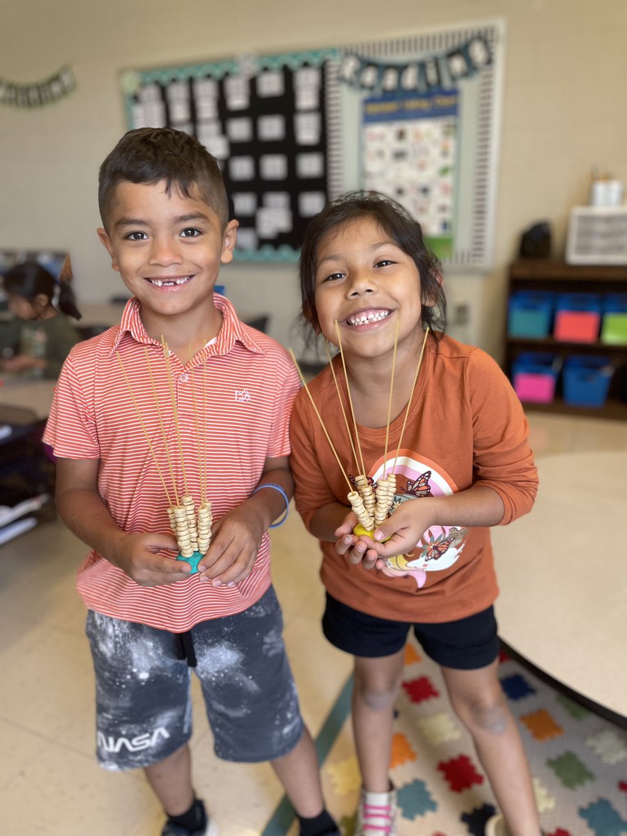 ChicopeeWoods's tweet photo. After Mrs. Pilcher’s 𝐦𝐚𝐭𝐡𝐞𝐦𝐚𝐭𝐢𝐜𝐢𝐚𝐧𝐬 explored 10 then 1 more/1 less by making comparisons between the length of their Cheerios “𝐮𝐩 𝐨𝐧 𝐭𝐨𝐩,” they engineered their own designs! @Hall_Schools #SoMuchLearning #MakingMathFun #MathLiteracyConnection✋🏽🔟📖 https://t.co/zSaJRnEJPI
