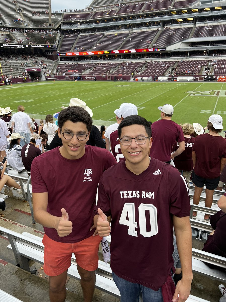 aggieachieve's tweet photo. Hussein and his residential mentor are loyal Aggie fans and waited out the storm to watch @AggieFootball 

#BTHOSHSU #aggiegameday https://t.co/B0YtKYgpGD