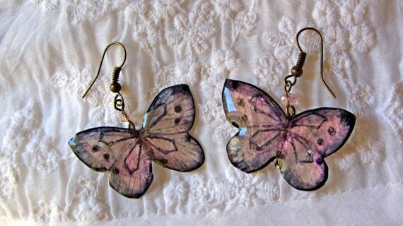 OrganicDesign5's tweet photo. In the minouette shop: Pale pink butterfly earrings, Translucent Resin butterfly dangles, Hand painted Light magenta butterfly jewelry by OrganicDesignNL at https://t.co/soa1uwvDZJ https://t.co/WnqVIxbzy3
