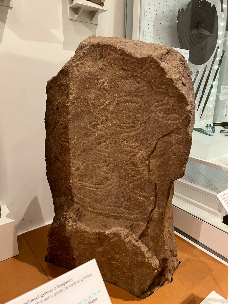 MharaStarling's tweet photo. Just outside Bryn Celli Ddu, an ancient burial chamber on Anglesey, North Wales…is a glorious standing stone decorated with intricate stone carvings. 

But did you know the stone on location is in fact a replica? The actual patterned stone now lived in St. Fagans museum. https://t.co/R8sWUBHUOO