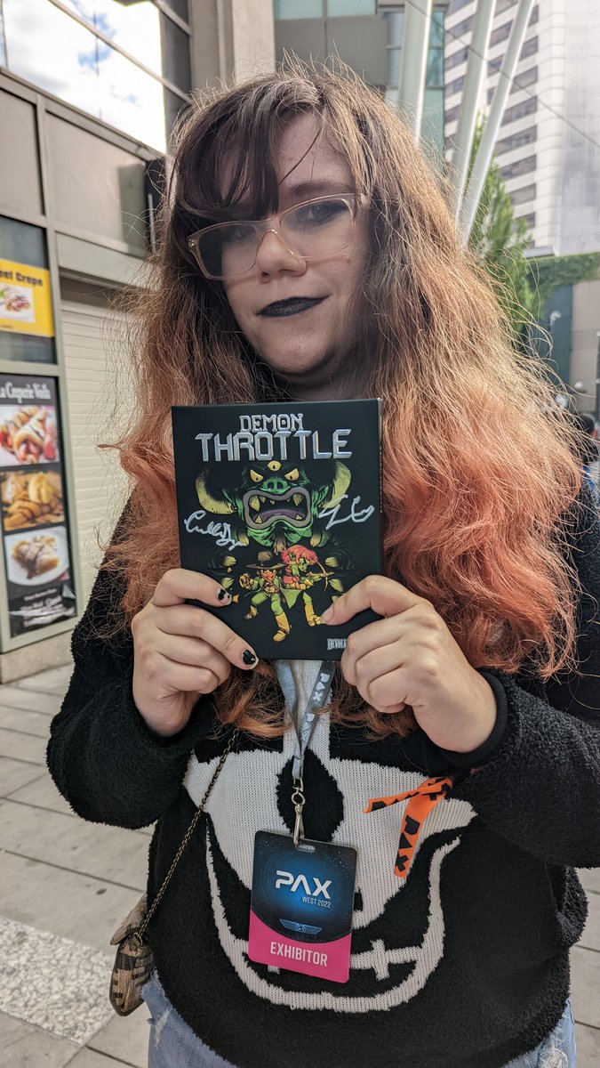 DreadXP_'s tweet photo. After playing and loving the game at PAX East, DreadXP video editor Ash gets a signed copy of Demon Throttle from @doinksoft @devolverdigital at #PAXWest https://t.co/IEzz53aZTv