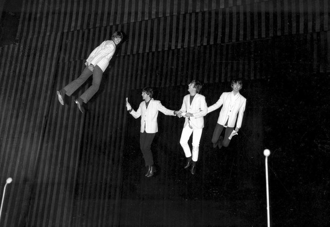 crockpics's tweet photo. The Beatles are suspended in midair above the stage during rehearsal for their part in the charity show 1964. https://t.co/bzShBfo0iR