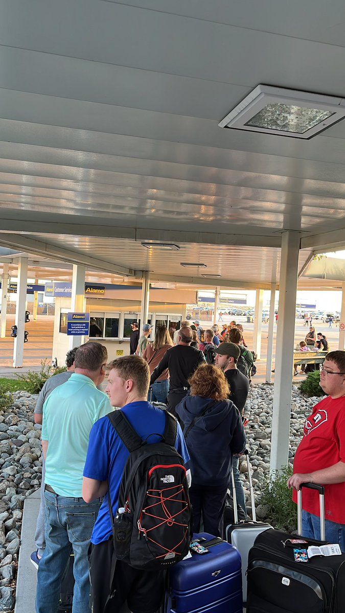 cknicholas's tweet photo. @Alamo waiting patiently for a car in a LONG line at Alamo at Denver airport, just as many behind us.  Holiday rush indeed. https://t.co/91kNHoFCwY