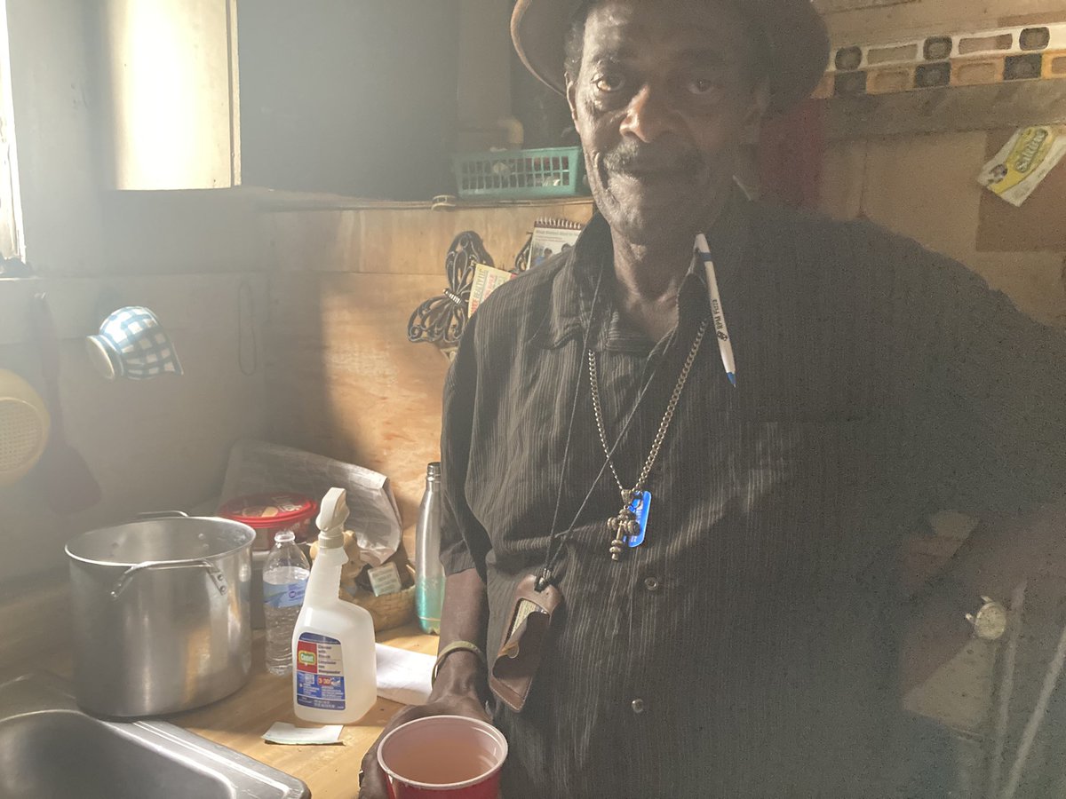 blondeafro's tweet photo. This is Marshall in his home in Jackson, Mississippi. The water has been brown from his taps (that’s a cup of it he’s holding) for about 8 months. He has no choice but to drink it. https://t.co/psVwZT1TRE