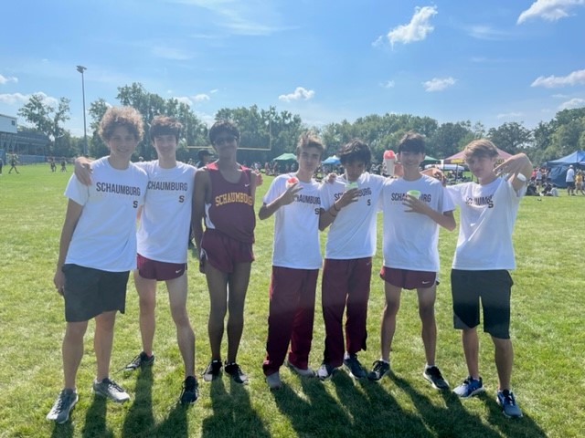 Enjoying the delicious icy fruits of their labor - Schaumburg Varsity Boys XC 4th Place at the Warren Township Bill Dawson Invite.  All finished in the top 40 and with Personal Bests. Owen Whelan came home with some hardware for his 14th place finish!  Go Saxons!!