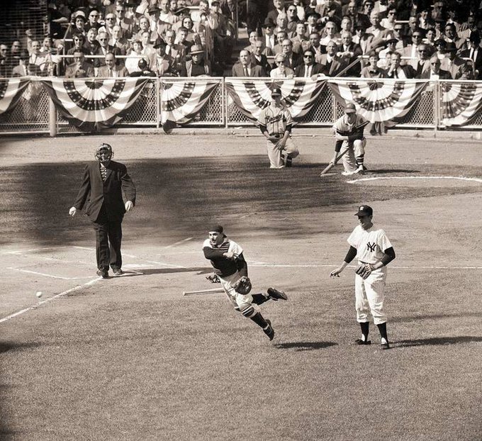 Yogi Berra makes a play during game 3 of the 1958 World Series