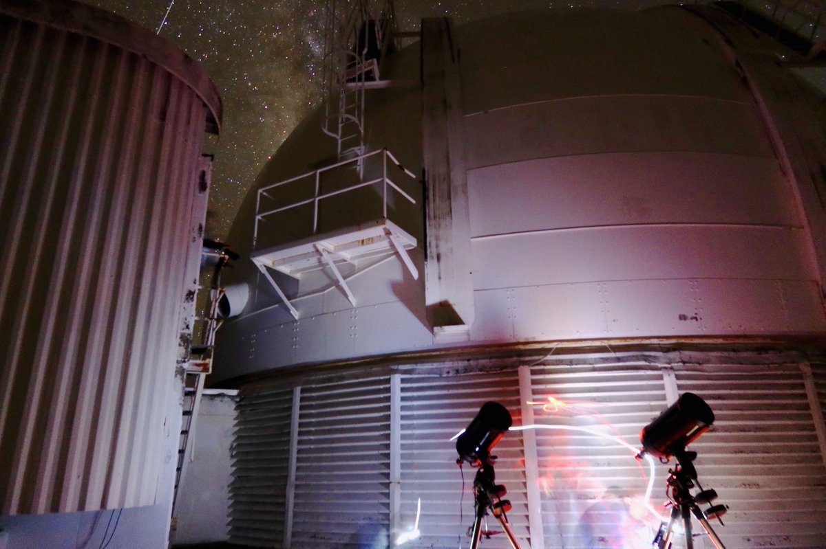Tonight’s favourite photo shows #durhamCfAI <a href="/DurhamPhysics/">Durham Physics</a> students Ryan and Lily working in a blur outside the <a href="/INGLaPalma/">Isaac Newton Group</a> Isaac Newton Telescope on La Palma.
