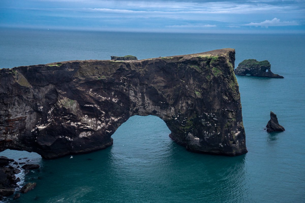 TheKloudGuy's tweet image. The Dyrhólaey Peninsula is a 120-metre promenade famed for its staggering views of Iceland’s South Coast, as well as its historic lighthouse and wealth of birdlife. It is home to a rock arch of the same name.

#iceland #dyrholaey