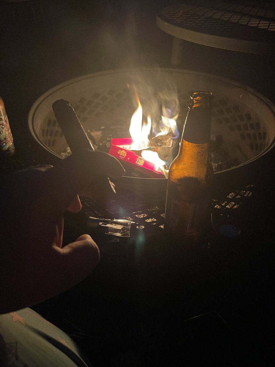 thegamestreamtv's tweet photo. Cigar, Angry Orchard, fire and my dog. Best end of a week for me https://t.co/NBP8KyPp9U