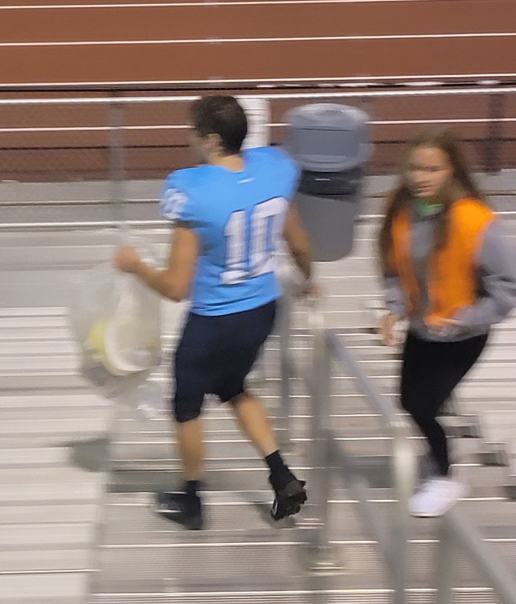 What does the winning QB do after winning the Battle of the Bell? He gets a trash bag and helps the custodians clean up the student section. Lake Forest QB Jonathan Tyndall is a leader. #delhs <a href="/302sports/">302 Sports LLC</a>