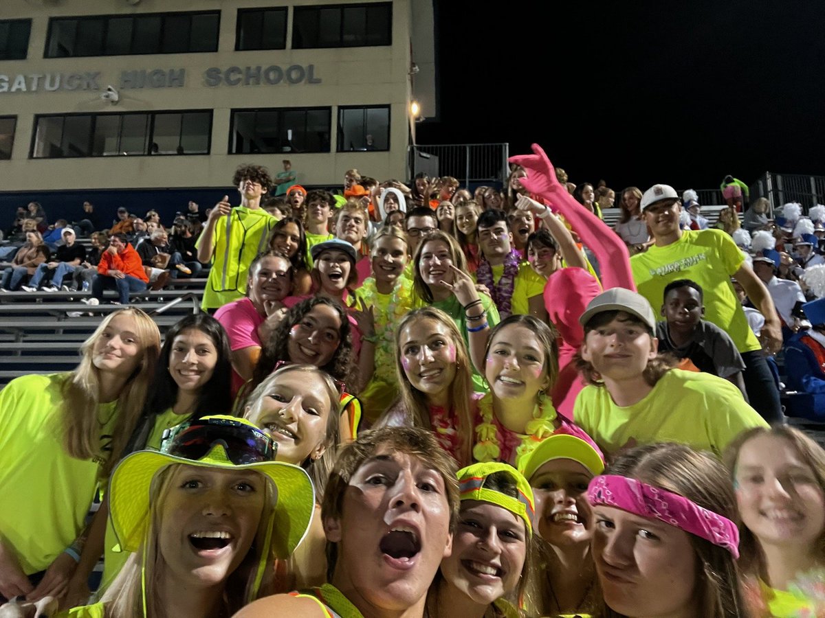 DanDAddona's tweet photo. Saugatuck student section rocking the Holland Sentinel #SentinelSelfie way to represent in neon force! @SaugatuckAthle1 @HollandSentinel https://t.co/Zmah5N0ZIB