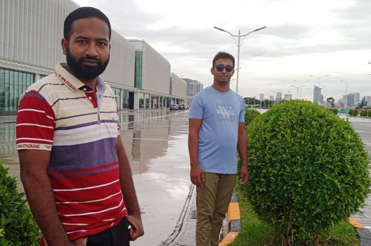 Two friends on Cambodia office visit
