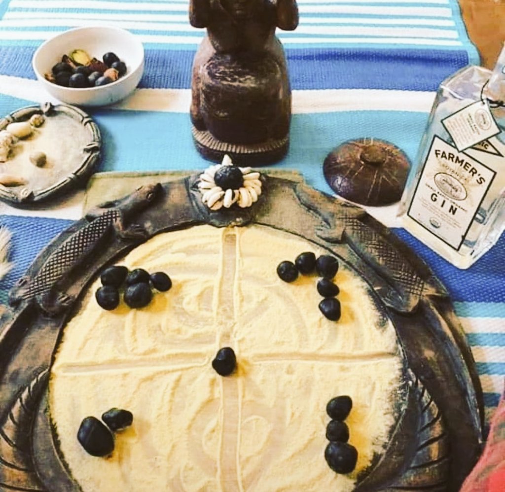 IfakoladeIrorun's tweet photo. Opon Ifa (divination tray) and ikin (sacred palm nuts).  These are two of the most important resources for Ifa divination. https://t.co/IxQ25PdO0H