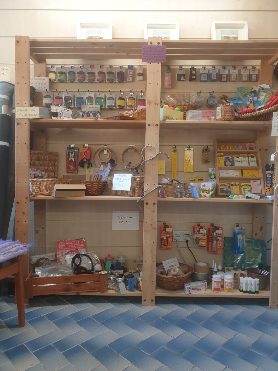 New stock means some rearrangement of the displays. Making the most of the slat wall and hooks to show off new sashiko supplies.