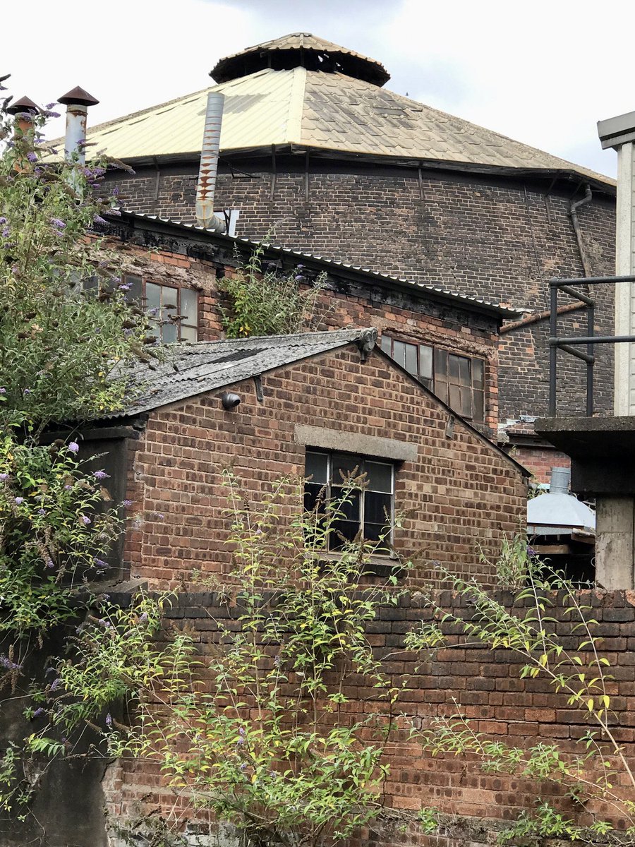 coal_legacies's tweet photo. Truncated cone of New Dial #Glassworks viewed from the #Stourbridge #Canal Town Arm, one of two built in late 18th C now occupied by Plowden & Thompson since 1922 producing industrial glassware inc. catsβ eyes #industrialarchaeology #industriallandscape #towpathtrails #explore https://t.co/sLALs6EGup