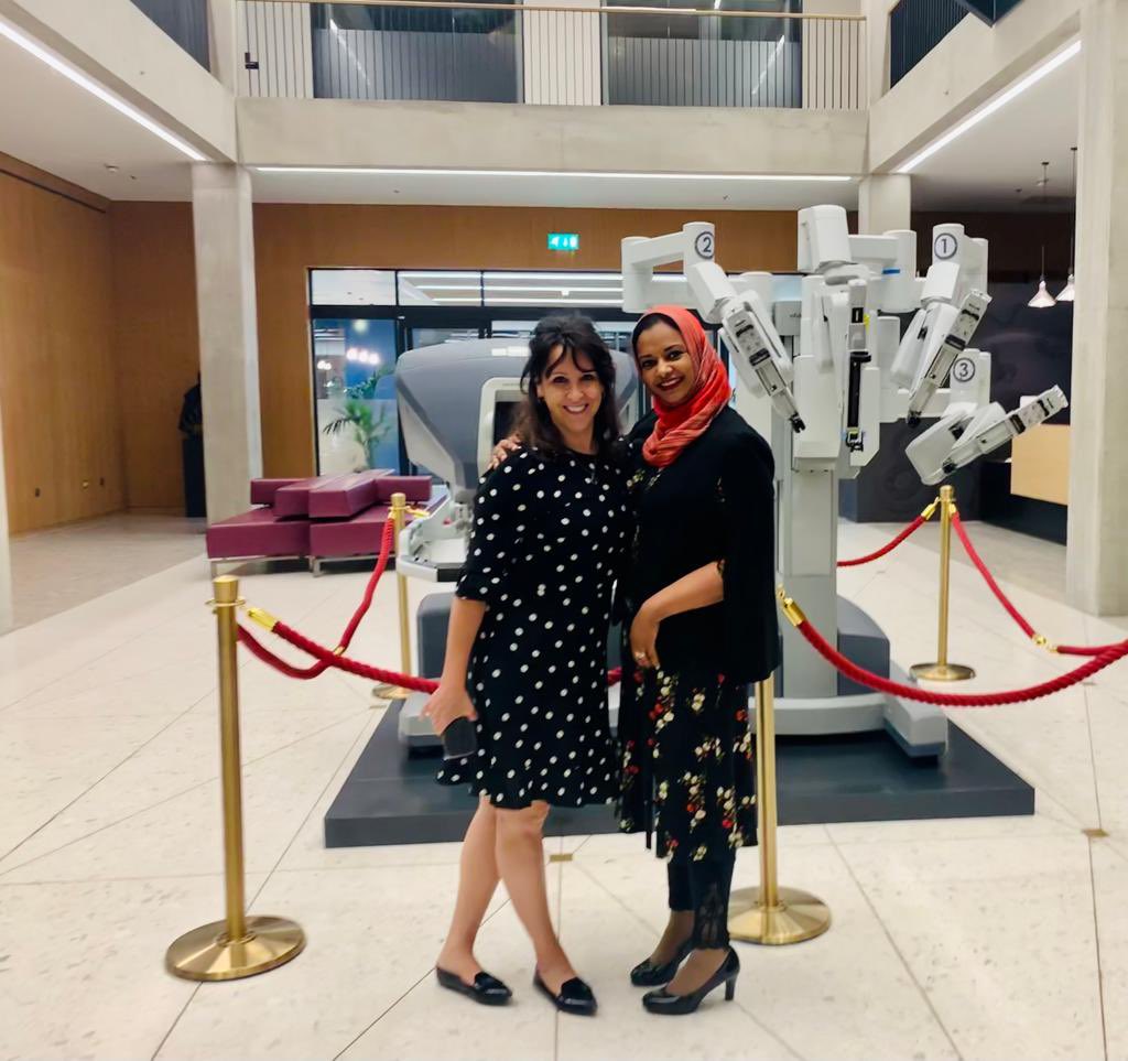 VictoriaPegna's tweet photo. First female proctor in robotics in the UK!!! @NuhaZsurgeon you’re amazing and we need more of you! Beautiful robot in the @RCSnews England new building! @IntuitiveSurg @Dukes_Club https://t.co/fvE0wY17HA