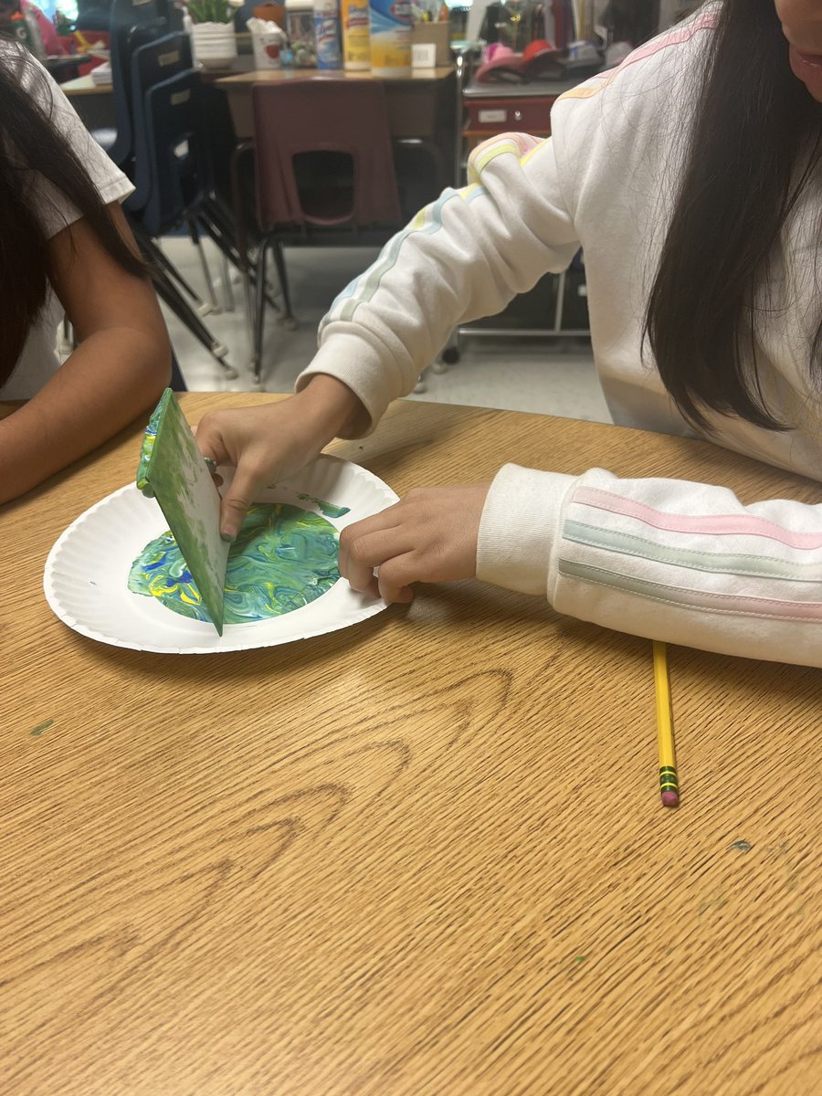 Students working on AI phases of the moon, and making the earth by marbling yellow and blue to make green! #ALLIN #TeamLaBelle #ArtsIntegration