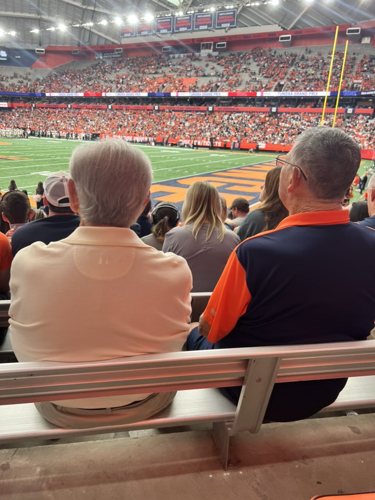 cneytel's tweet photo. These 83-year-old Syracuse fans need the game day helmet. Just sayin' @cusefootball! #CuseGameDay https://t.co/zHceLgeiVD