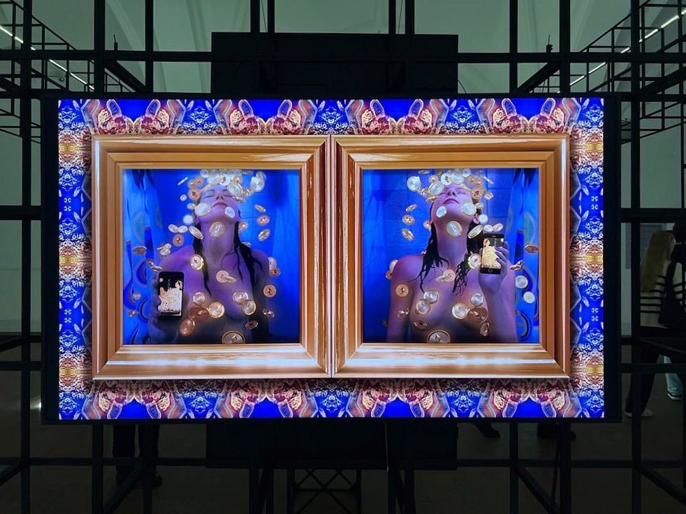carlagannis's tweet photo. The #Cryptopong exhibition has opened at @Nikolajkunsthal curated by @idakvetny & @dianadigital003 💙 TY @claudia75171655 for this in-person pic of my work & psyched to be in show of pioneers in XR art https://t.co/lHOILKbcam