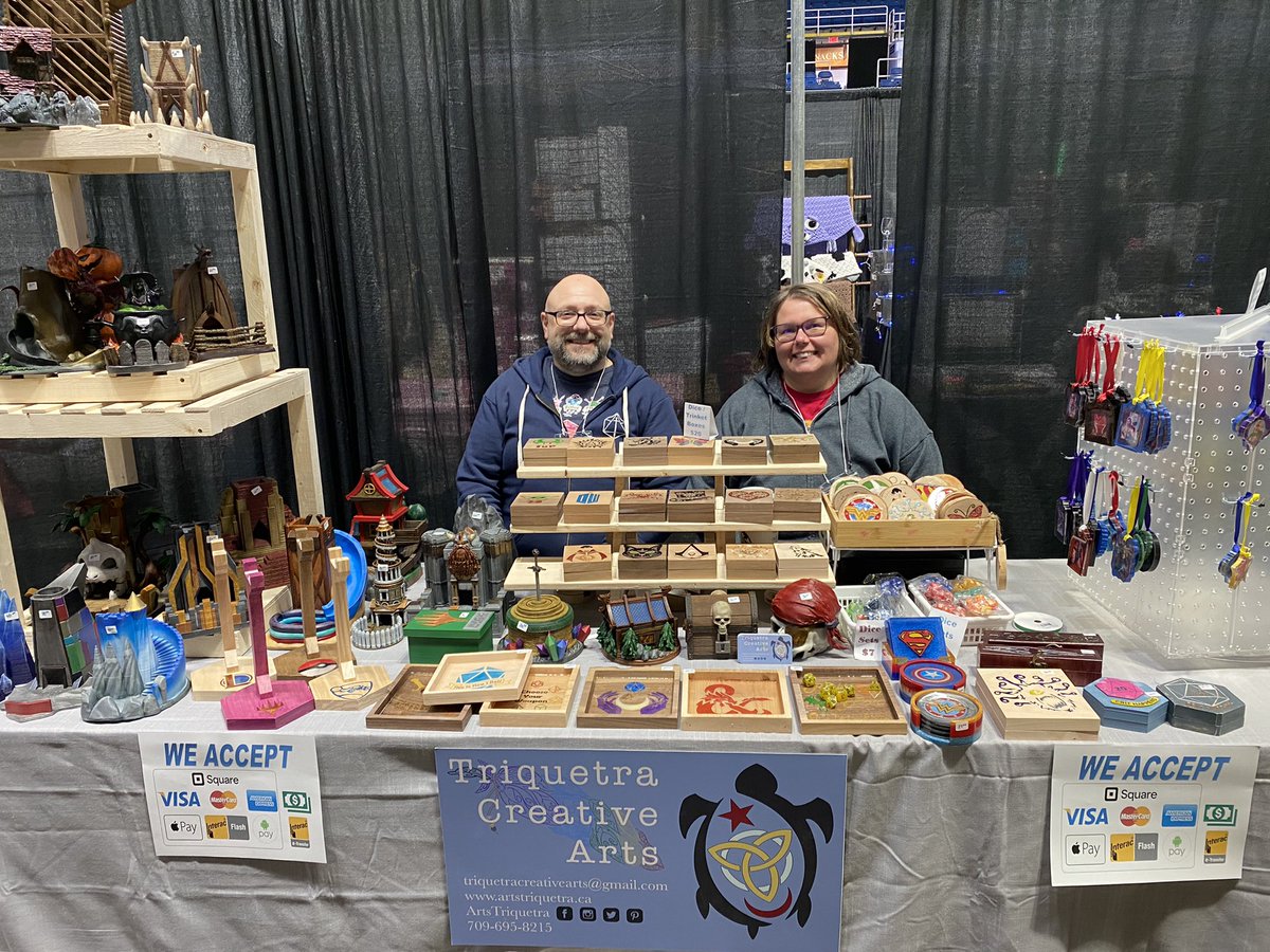 ArtsTriquetra's tweet photo. All set up at @CaperConNS. Lots of fun things available, especially for my fellow dice goblins.  #geek #fandom #dungeonsanddragons #dice https://t.co/S0stuVwn3M