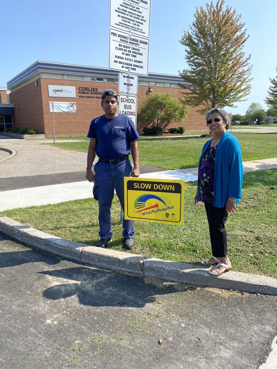 TinaGodsoe's tweet photo. Thank you trustee Susan Benjamin for bringing Corliss students backpacks and these helpful slow down signs. Our custodian Mr. Robbie was happy to put them up. Trustee Benjamin also commented on how amazing Corliss looks. Thanks Mr. Robbie @PeelSchools @FacilitiesPDSB #SafetyFirst https://t.co/JFROWu3m1Y
