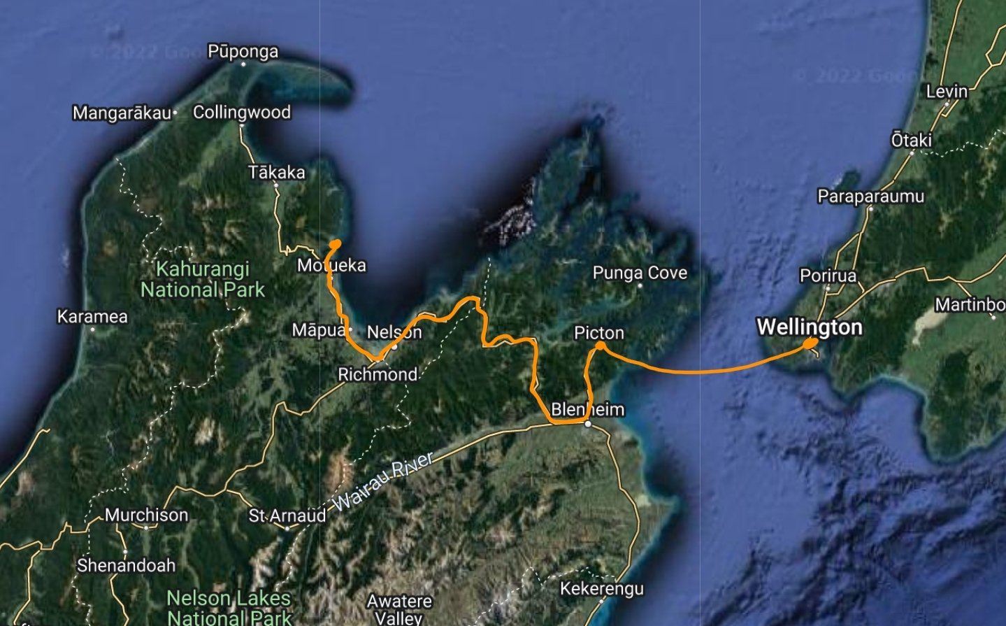 Map of New Zealand's North and South Island; an orange trail leading from Wellingtont o Picton to Abel Tasman;s Motueka