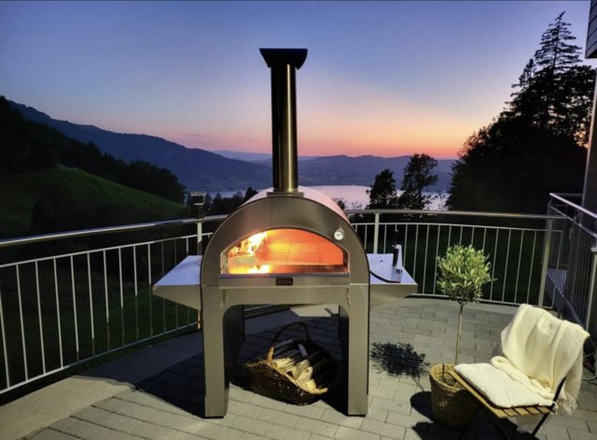 There’s just something about the glow of #saturdaynight!
4 Pizze is woodfired cooking at its finest. It’s a family favorite for pizzas & more. Equipped with Heatkeeper Firebrick floor and patented flue system for amazing heat retention.

Available in tabletop or with base