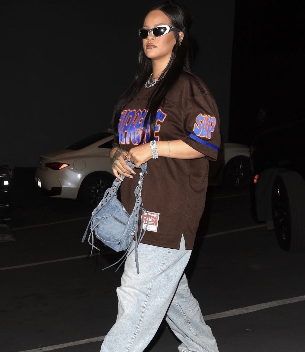 DropsByJay on X: 👀 @rihanna in the Supreme Mitchell & Ness Football  Jersey 🔥  / X