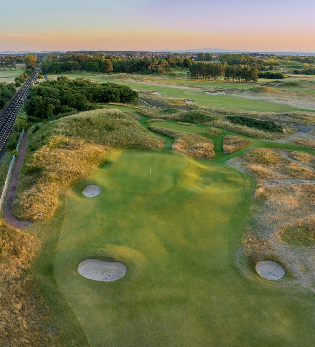 Lovely evening glow on our Par 5 - 2nd hole <a href="/Hillside_Greens/">Life on the Links</a> <a href="/HillsideProshop/">Hillside_ProShop</a>  
📸<a href="/BeyondDrones/">James Hogg</a>