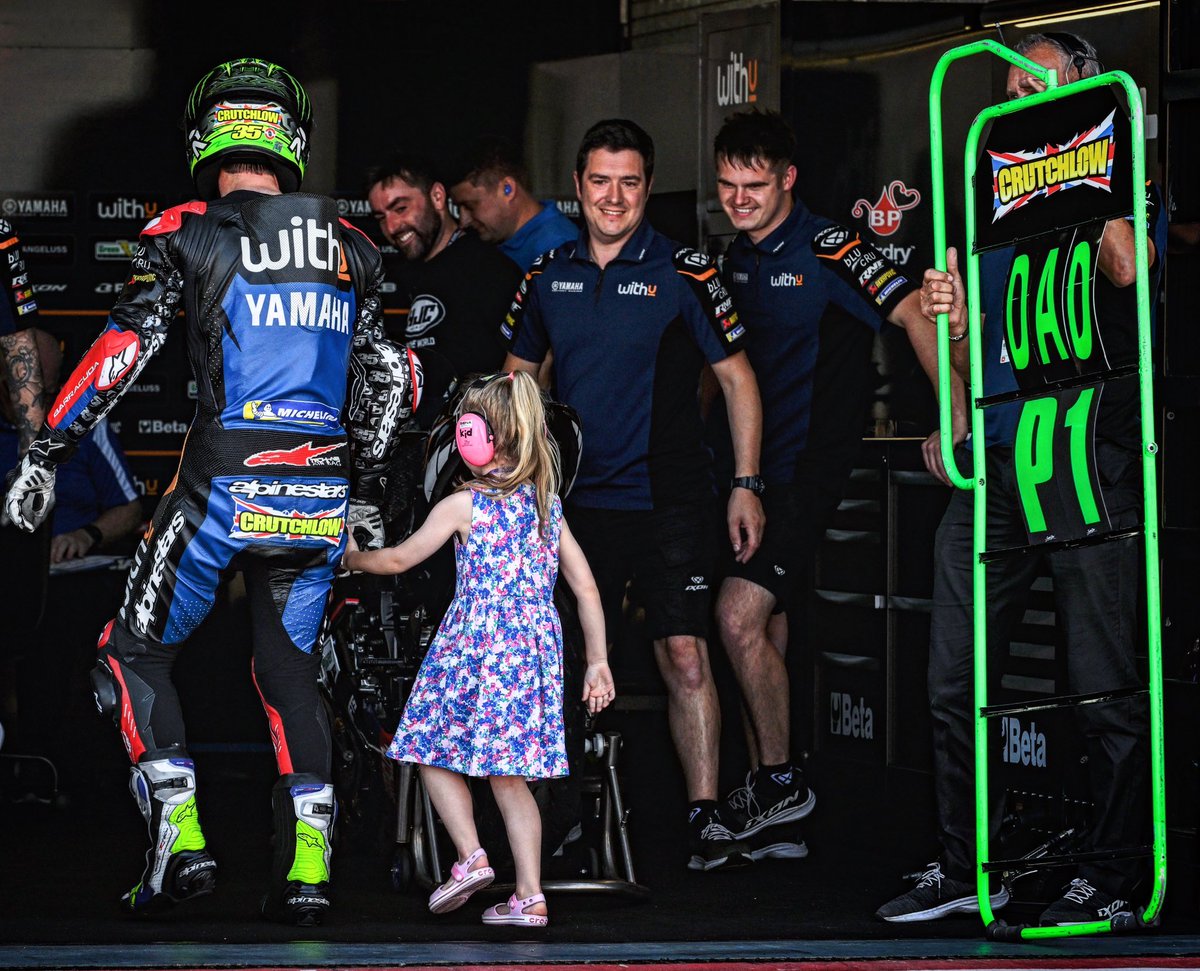 GarethHarford's tweet photo. A nice moment for Cal Crutchlow when he came back to the garage to find his daughter holding the pit board with ‘Dad P1’ on it. 😍
.
.
#motogp #calcrutchlow @calcrutchlow #yamaha #daddysgirl #family #aragongp #nikon #z9 https://t.co/FX980t6CDo