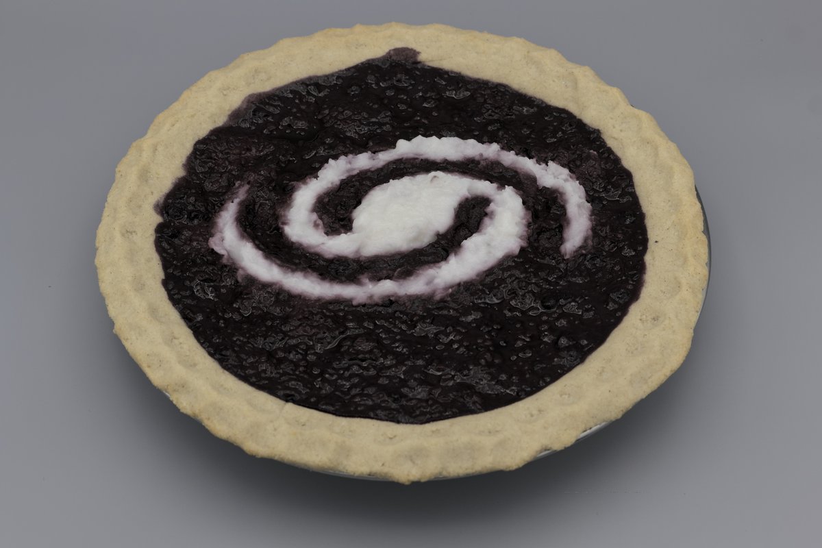 petroffm's tweet photo. I baked a blackberry pie with a spiral-galaxy-shaped inset (which won second place in a @CenterForAstro baking contest earlier this week): https://t.co/03MAmL8U7E https://t.co/vsfYoaXGm1