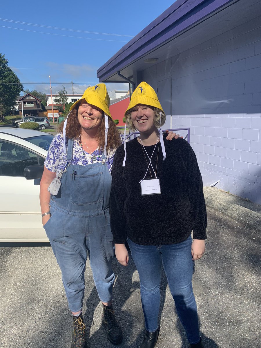 It’s a sunny day at <a href="/princerupertlib/">Prince Rupert Library</a>, but my colleagues had to try out their new rain hats from the library! Great promo items! @LauretteTesla